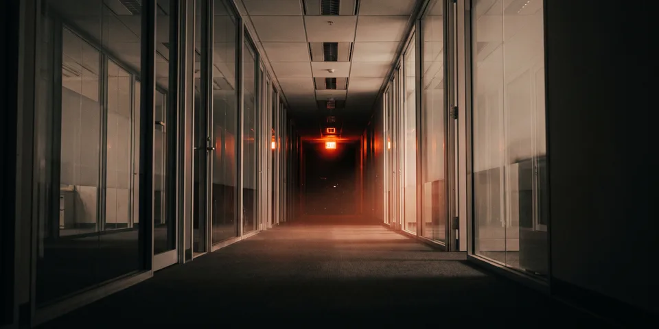 Enterprise SEO running one standard across the organization, shown as an orange light down a long office corridor Enterprise SEO running one standard across the organization, shown as an orange light down a long office corridor