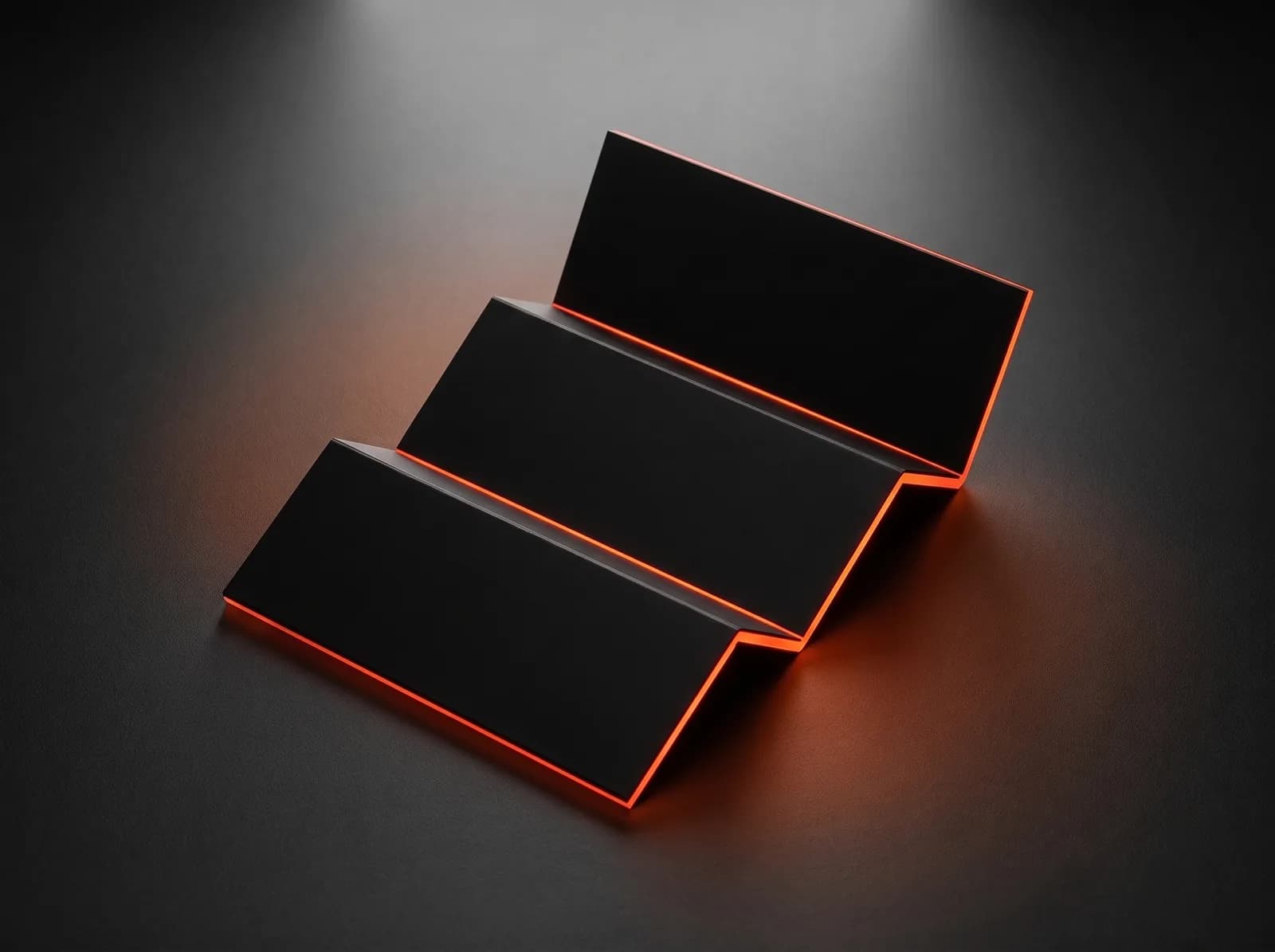 Responsive web design that adapts to every screen A black panel folded like an accordion from wide to narrow, orange light along every fold: responsive web design